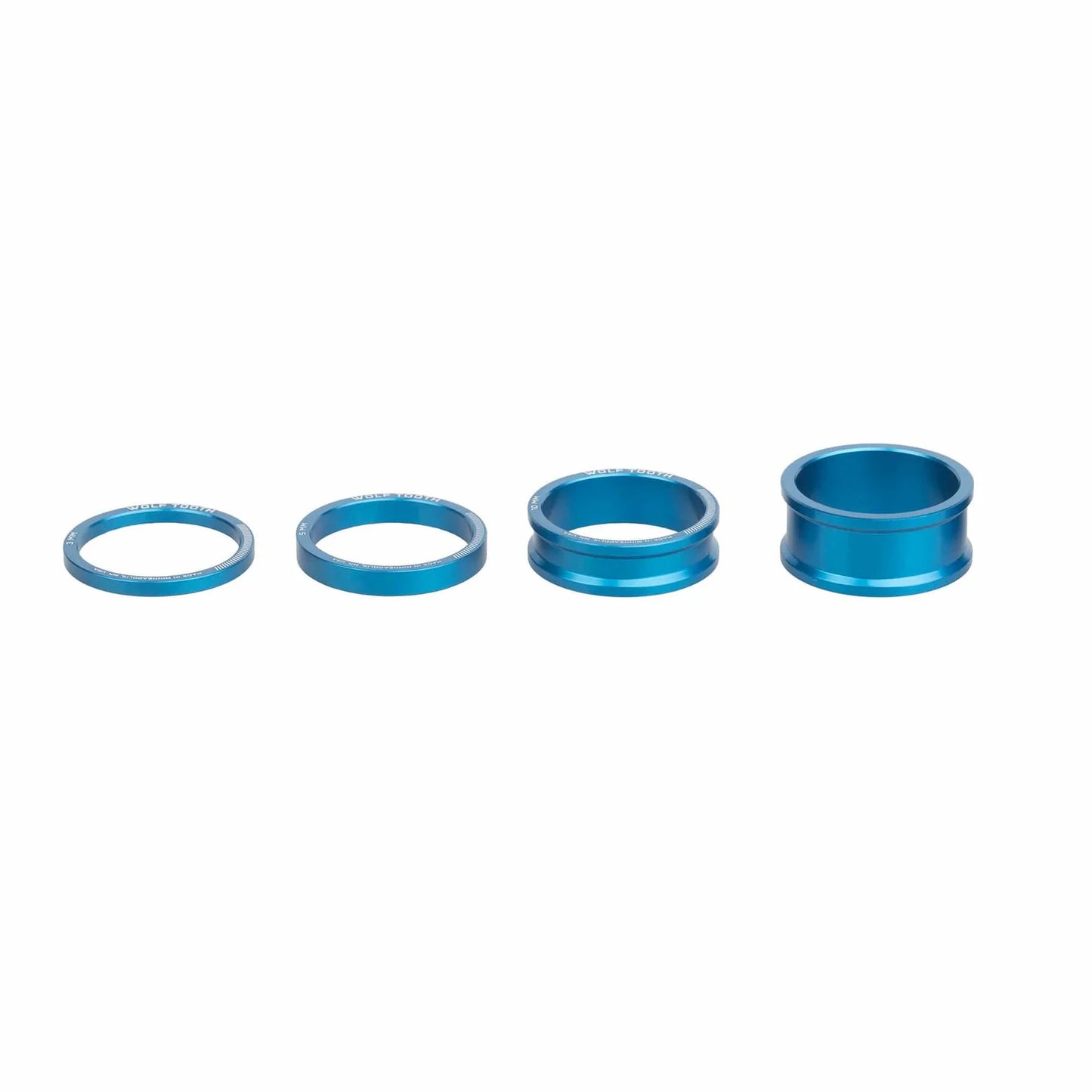 Juego de espaciadores de dirección WOLF TOOTH de aluminio, 4 piezas, 1"1/8, azul