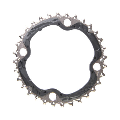 Plato intermedio SHIMANO SLX M660/670/XT M780 de 10 velocidades, 4 orificios, 104 mm — vista del plato sobre fondo blanco