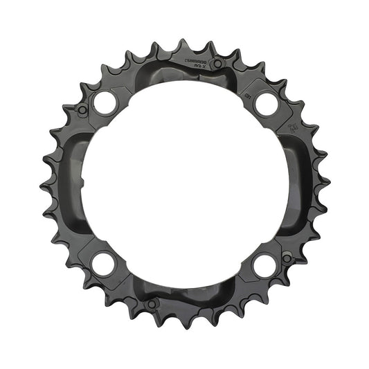 Plato intermedio SHIMANO DEORE M590 de 9 velocidades, 4 tornillos, 104 mm, negro — vista del plato sobre fondo blanco