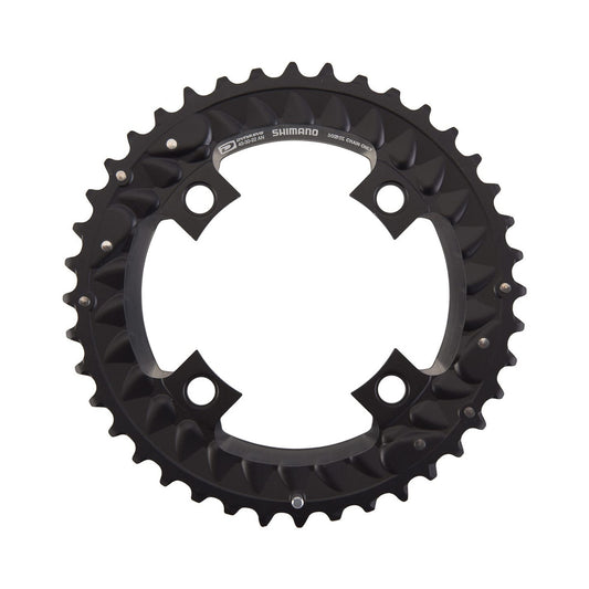 Plato exterior SHIMANO SLX M7000 de 10 velocidades para triple plato, 4 tornillos, 96 mm — vista del plato sobre fondo blanco