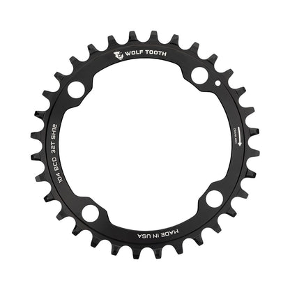 Plato monoplato WOLF TOOTH de 104 BCD, 12 velocidades, para Shimano, 4 agujeros, 104 mm, negro — vista del plato sobre fondo blanco