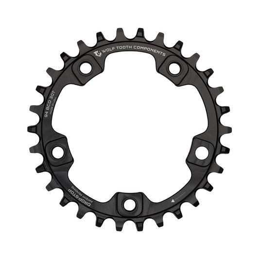 Plato monoplato WOLF TOOTH de 94 BCD, 9/10/11/12 velocidades, 5 agujeros, 94 mm, negro — vista del plato sobre fondo blanco