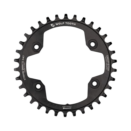Plato monoplato WOLF TOOTH de 96 BCD, 9/10/11/12 velocidades, para Shimano XTR M9000/M9020, 4 agujeros, 96 mm, negro — vista del plato sobre fondo blanco