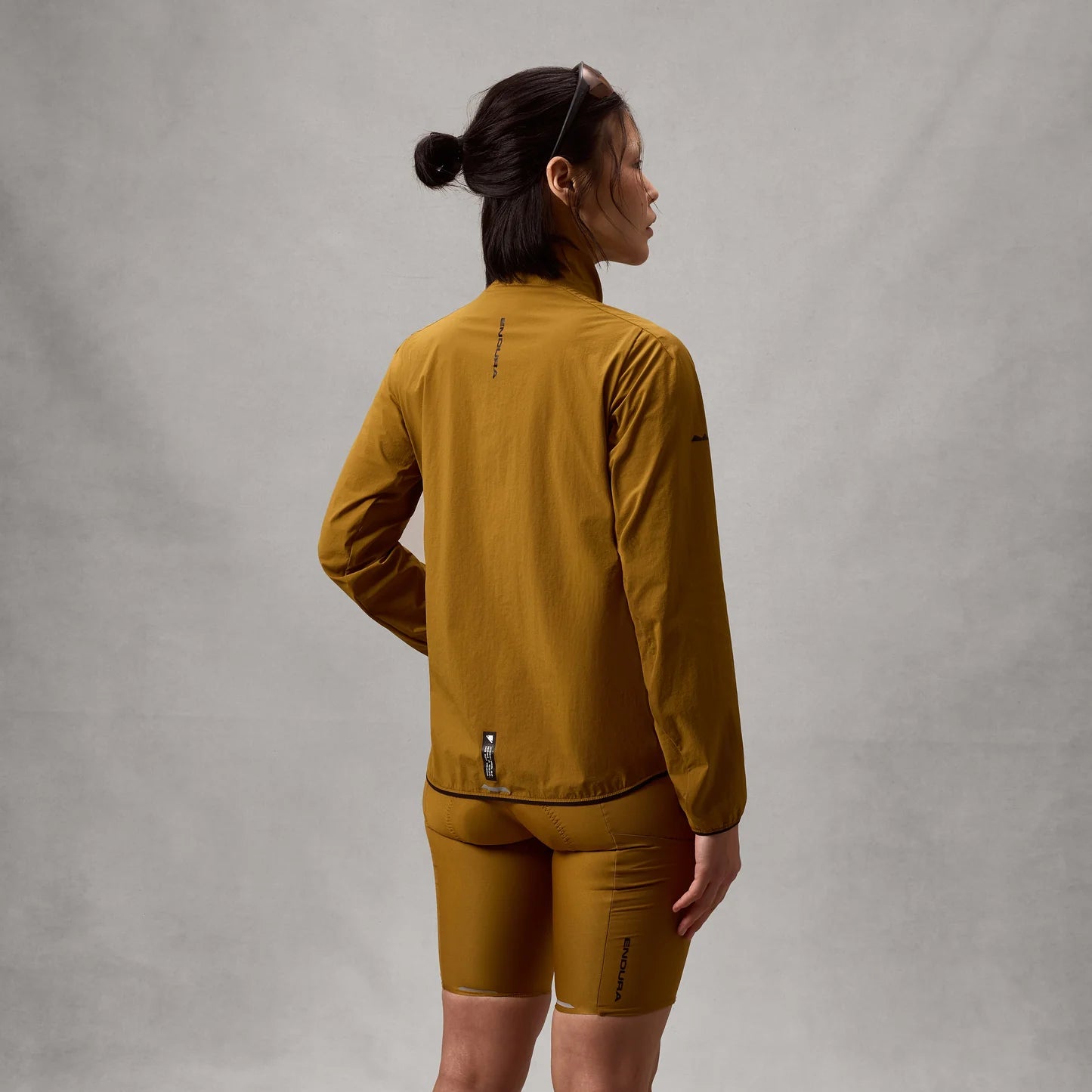 Chaqueta ENDURA ALLTRACK RIDE PACKABLE Mujer Bronce