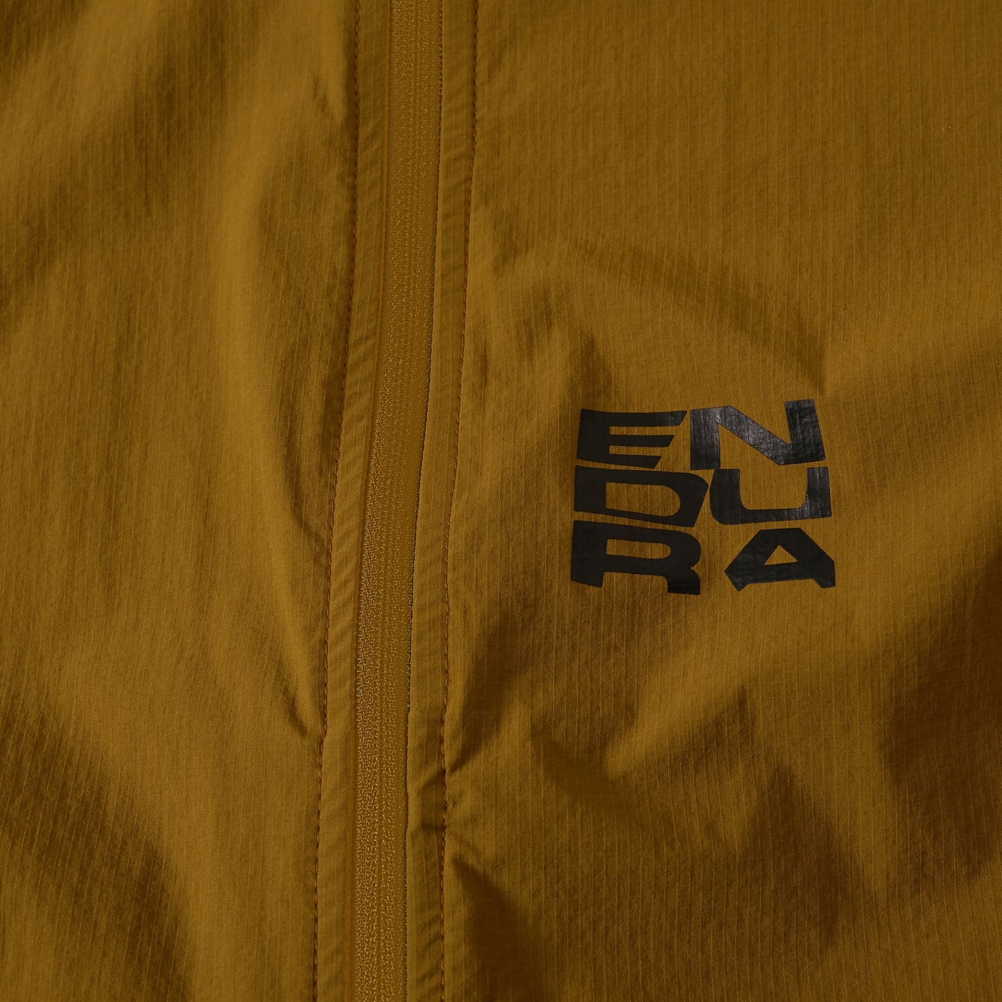 Chaqueta ENDURA ALLTRACK RIDE PACKABLE Mujer Bronce