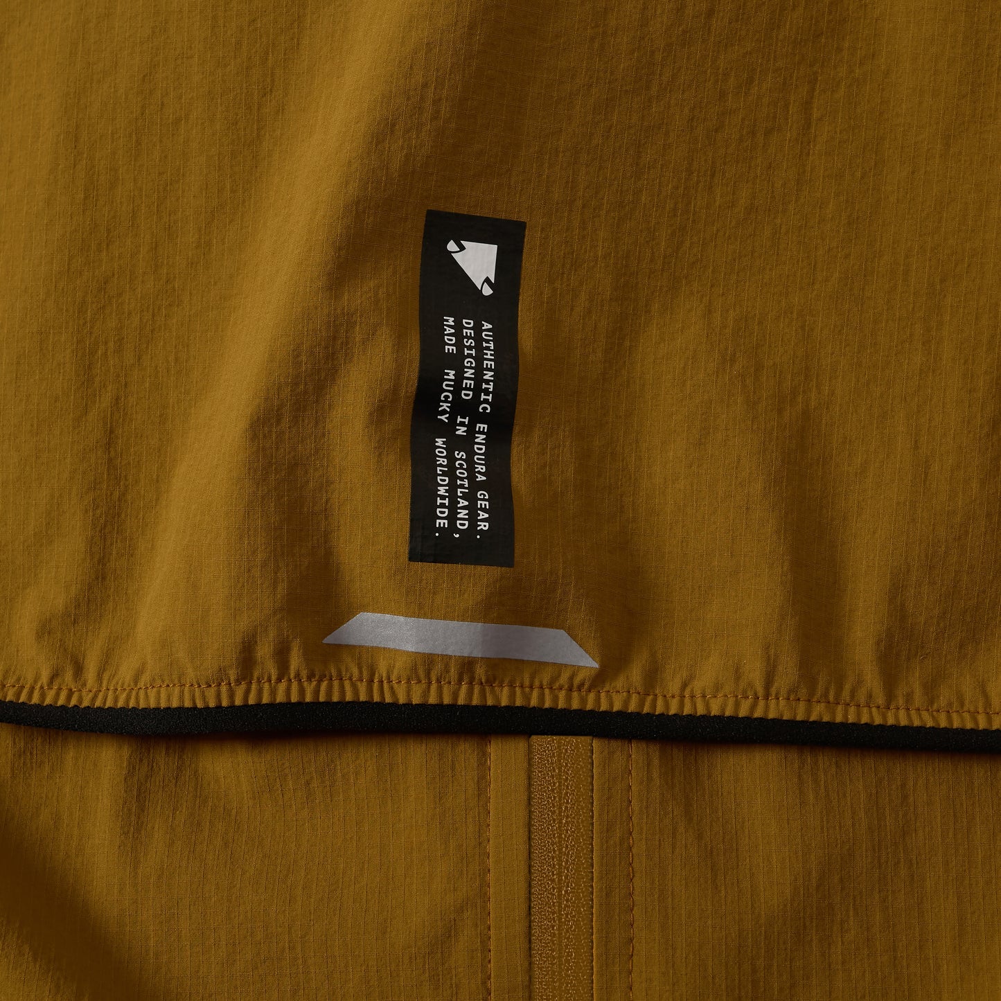 Chaqueta ENDURA ALLTRACK RIDE PACKABLE Mujer Bronce