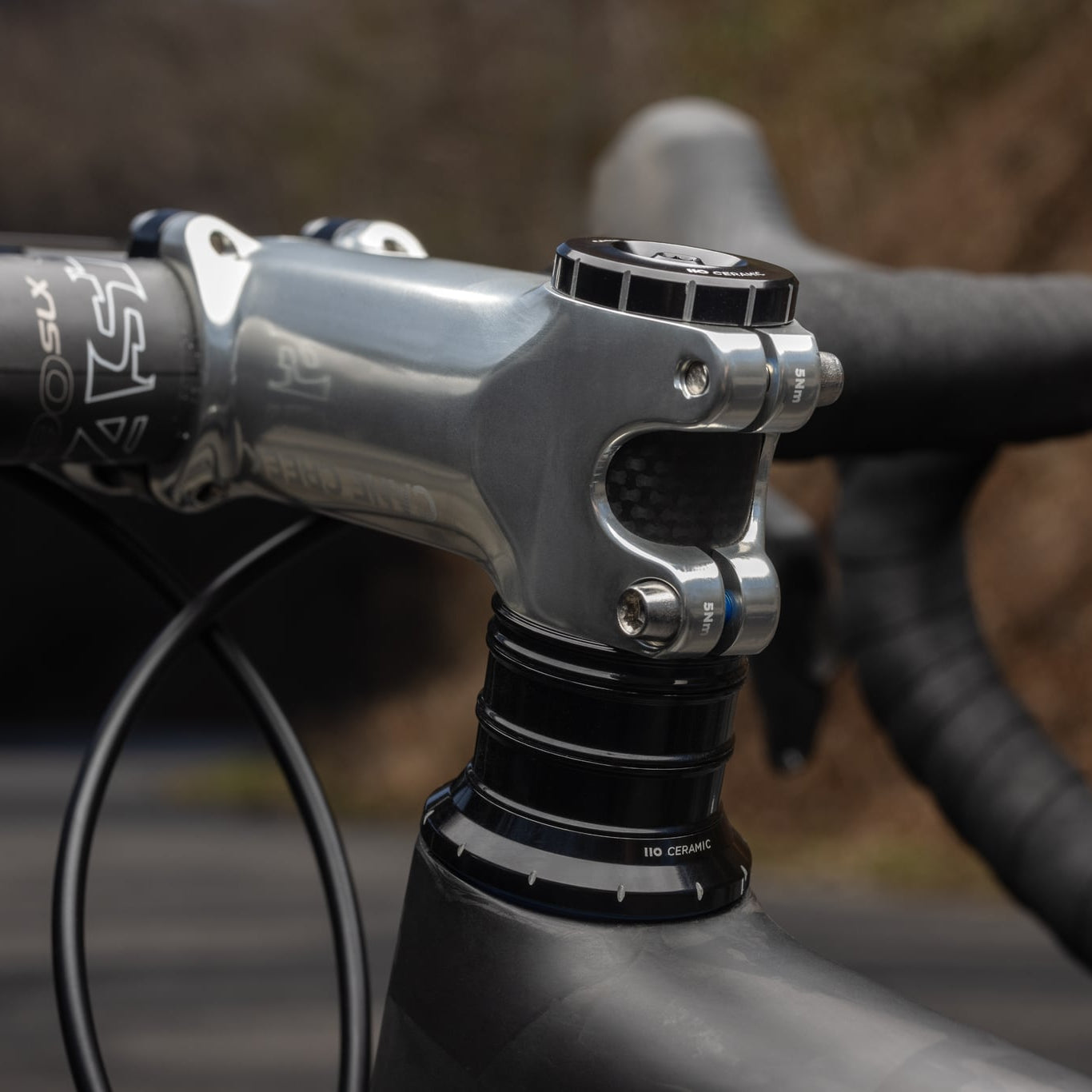 CANE CREEK 110 Juego de dirección cónico de cerámica, 1 1/8"-1.5", IS41/28.6/H9 | IS52/40, negro/plateado