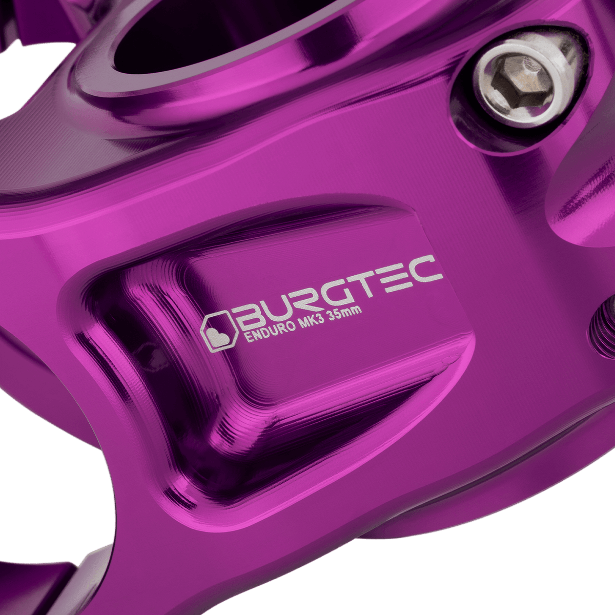 Potencia BURGTEC ENDURO MK3 violeta — detalle del cuerpo mecanizado