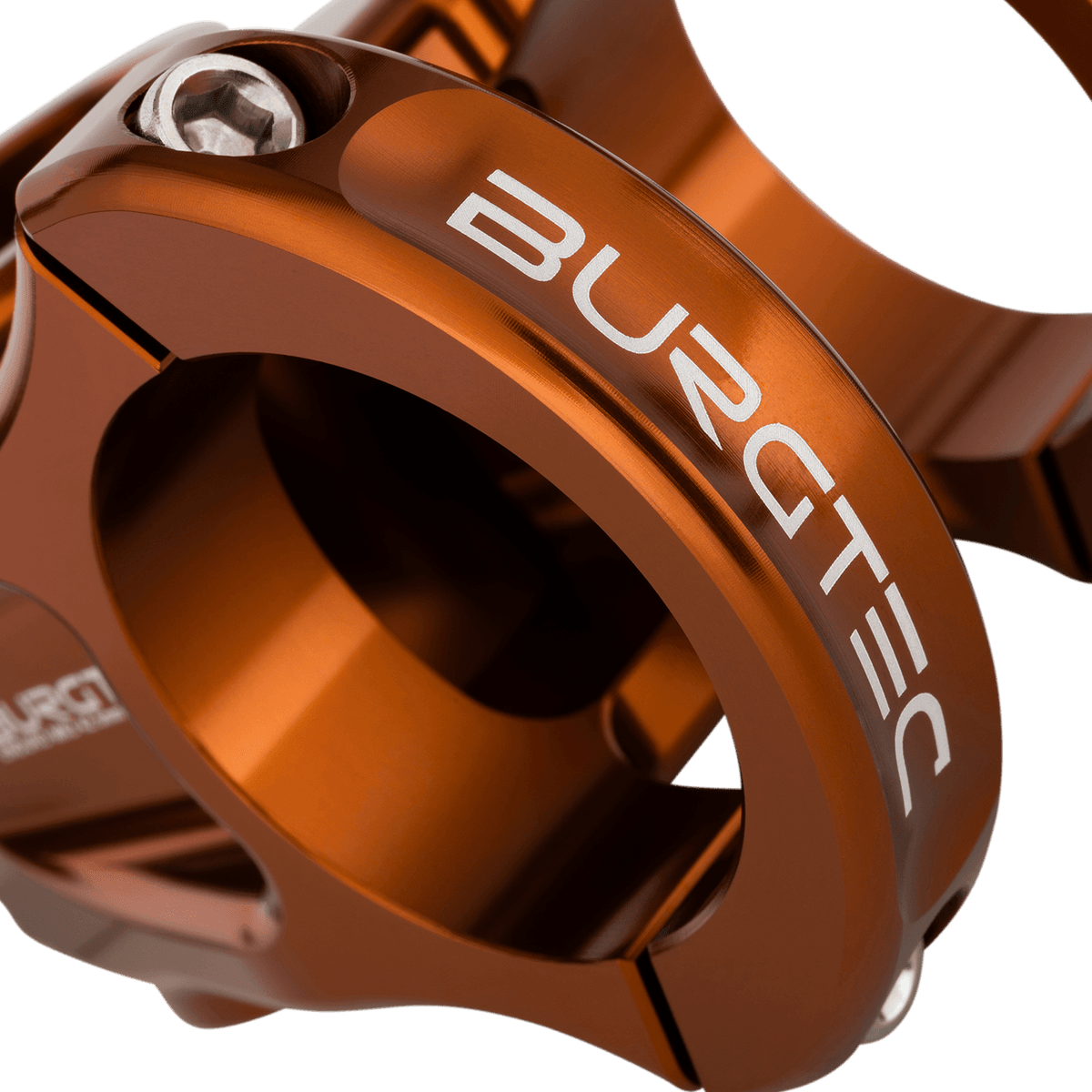 Potencia BURGTEC ENDURO MK3 bronce — detalle de la sujeción del manillar