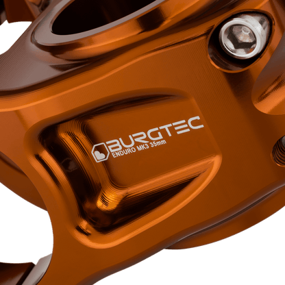 Potencia BURGTEC ENDURO MK3 bronce — detalle del cuerpo mecanizado