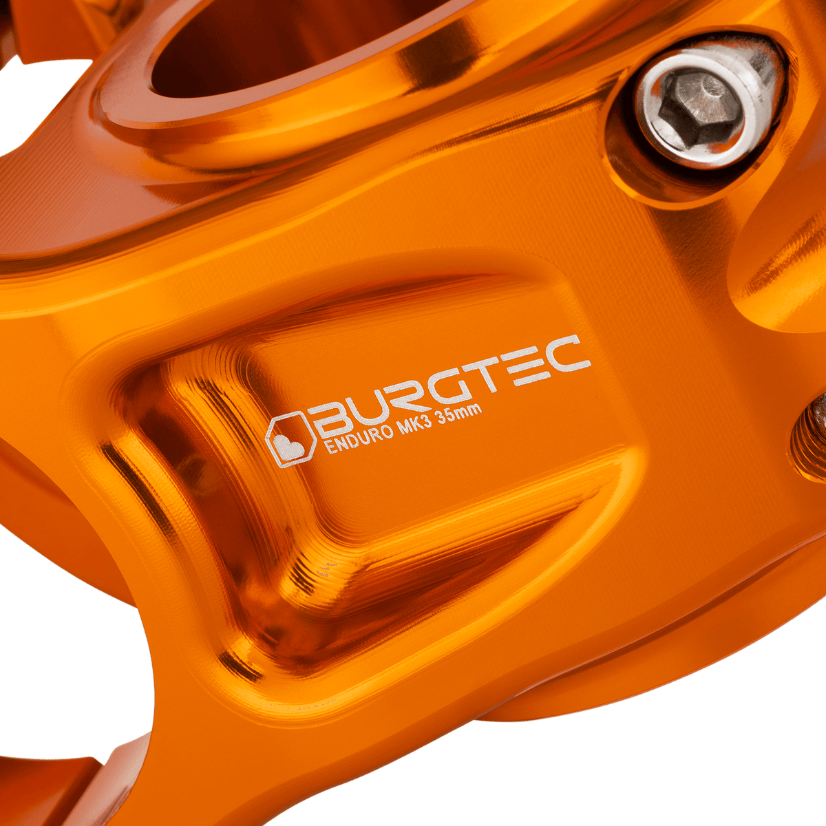 Potencia BURGTEC ENDURO MK3 naranja — detalle del cuerpo mecanizado