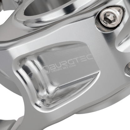 Potencia BURGTEC ENDURO MK3 plateada — detalle del cuerpo mecanizado