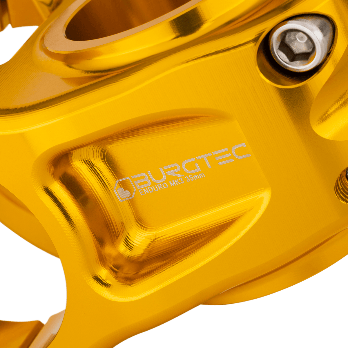 Potencia BURGTEC ENDURO MK3 dorada — detalle del cuerpo mecanizado