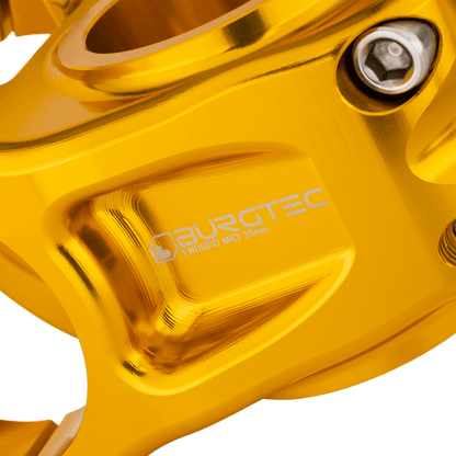 Potencia BURGTEC ENDURO MK3 dorada — detalle del cuerpo mecanizado