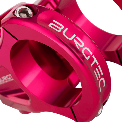 Potencia BURGTEC ENDURO MK3 rosa — detalle de la sujeción del manillar