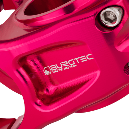 Potencia BURGTEC ENDURO MK3 rosa — detalle del cuerpo mecanizado