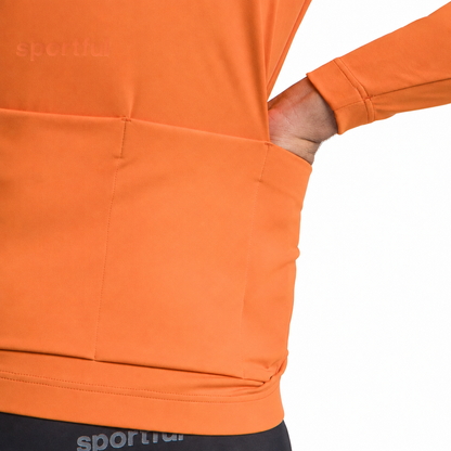Chaqueta SPORTFUL CLASSIC 2 naranja, bolsillo trasero sobre fondo blanco