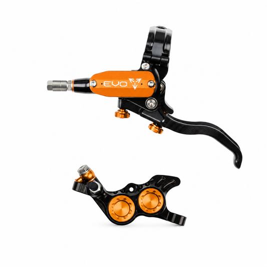 Freno HOPE TECH 4 EVO GR4 negro/naranja — maneta y pinza sobre fondo blanco