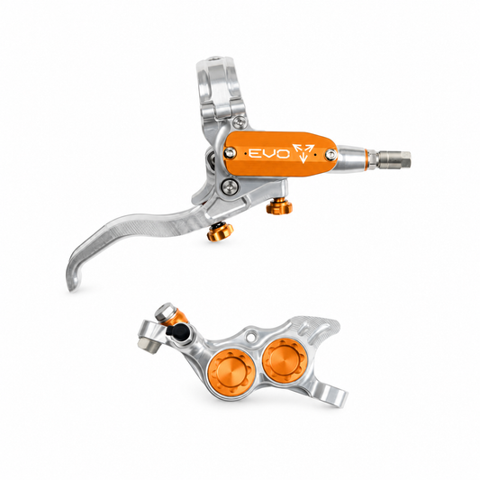Freno HOPE TECH 4 EVO TR4 plata/naranja — maneta y pinza sobre fondo blanco