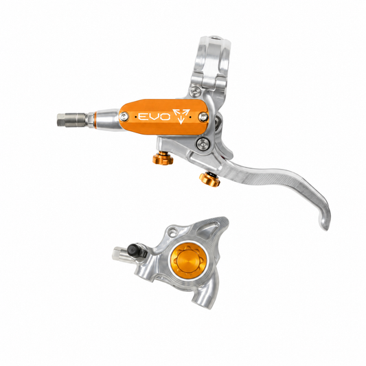 Freno HOPE TECH 4 EVO X2 FM plateado/naranja — maneta y pinza sobre fondo blanco
